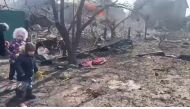 The aftermath of Russian artillery shelling on a residential area in Mariupol where a rocket hit a house, according to the Armed Forces of Ukraine, during the Russian invasion of Ukraine, in Mariupol, Ukraine, is seen in this screengrab from a video uploaded on social media on March 10, 2022. Armed Forces of Ukraine/Handout via REUTERS