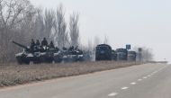 A view shows a convoy of pro-Russian troops during Ukraine-Russia conflict outside the separatist-controlled town of Volnovakha in the Donetsk region, Ukraine March 12, 2022. REUTERS