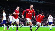 Cristiano Ronaldo celebrates after scoring their third goal.