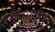 Ukrainian Prime Minister Denys Shmyhal receives standing ovation from Members of the Parliamentary Assembly of the Council of Europe after his address via videolink, in an extraordinary session to discuss Russia's invasion of Ukraine, in Strasbourg, France March 14, 2022. REUTERS/Arnd Wiegmann
