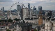 FILE PHOTO: The London Eye, the Big Ben clock tower and the City of London financial district are seen from the Broadway development site in central London, Britain, August 23, 2017. REUTERS/Hannah McKay