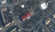 A satellite image shows a closer view of Mariupol Drama Theatre before bombing, as a word 