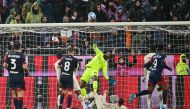 AC Milan's Mike Maignan makes a save REUTERS/Alberto Lingria