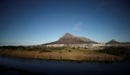 Contested land earmarked for a development which includes a new Africa headquarters for Amazon is seen alongside the Black River in Cape Town, South Africa, June 2, 2021. Picture taken June 2, 2021. REUTERS/Mike Hutchings/File Photo