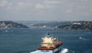 FILE PHOTO: An oil tanker passes through the Bosphorus to the Black Sea in Istanbul July 20, 2012. REUTERS/Osman Orsal