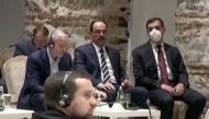 Russian billionaire Roman Abramovich listens as Turkish President Tayyip Erdogan (not seen) addresses Russian and Ukrainian negotiators before their face-to-face talks in Istanbul, Turkey March 29, 2022 in this screen grab taken from a video.