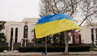 A Ukrainian flag flies outside the Russian embassy, after Spain announced it will expel some 25 Russian diplomats and embassy staff, amid Russia's invasion of Ukraine, in Madrid, Spain, April 5, 2022. REUTERS/Susana Vera