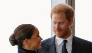 Britain's Prince Harry and Meghan, Duke and Duchess of Sussex, look at each other during a visit to One World Trade Center in Manhattan, New York City, U.S., September 23, 2021. REUTERS/Andrew Kelly