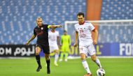 Al Rayyan’s Yacine Brahimi (left) in action against a Sharjah player during their Group A match, yesterday. 