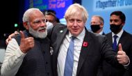 FILE PHOTO: Britain's Prime Minister Boris Johnson and India's Prime Minister Narendra Modi. Jeff J Mitchell/Pool via REUTERS/File Photo
