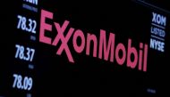 FILE PHOTO: The logo of Exxon Mobil Corporation is shown on a monitor above the floor of the New York Stock Exchange in New York, December 30, 2015. REUTERS/Lucas Jackson/File Photo
