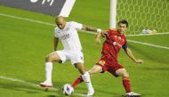 Al Sadd’s André Ayew (left) in action with FC Nasaf’s Umar Eshmurodov yesterday. 