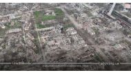 An aerial view shows damaged buildings, amid Russia's ongoing invasion of Ukraine, in Mariupol, Ukraine in this handout picture taken with a drone released April 24, 2022. Azov/Handout via REUTERS 