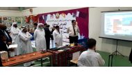Officials at an exhibition showcasing achievements of the students.