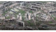 An aerial view shows damaged buildings, amid Russia's ongoing invasion of Ukraine, in Mariupol, Ukraine in this handout picture taken with a drone released April 24, 2022. Azov/Handout via REUTERS
