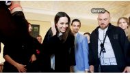 U.S. actor and UNHCR Special Envoy Angelina Jolie interacts with children at the main railway station during her visit to Lviv, amid Russia's ongoing invasion of Ukraine, in Lviv, Ukraine April 30, 2022 in this still image obtained from a social media video. Video recorded April 30, 2022. Lviv.Media via REUTERS