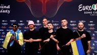 Kalush Orchestra from Ukraine pose for photographers after winning the 2022 Eurovision Song Contest, in Turin, Italy, May 15, 2022. Reuters/Yara Nardi