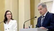 Finland's Prime Minister Sanna Marin and Finland's President Sauli Niinisto attend a joint news conference on Finland's security policy decisions at the Presidential Palace in Helsinki, Finland, May 15, 2022. Heikki Saukkomaa/ Lehtikuva/via Reuters 