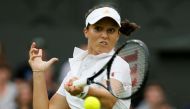 Laura Robson of Britain hits a return to Mariana Duque-Marino of Colombia during their women's singles tennis match at the Wimbledon Tennis Championships, in London June 28, 2013. REUTERS/Stefan Wermuth (BRITAIN - Tags: SPORT TENNIS)/File Photo