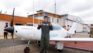 Mack Rutherford, a 16-year-old British-Belgian pilot, poses for a photo after arriving at the Wilson airport as part of a quest to become the youngest person to fly around the world solo, in Nairobi, Kenya, May 18, 2022. REUTERS/Baz Ratner
