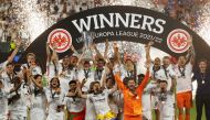 Eintracht Frankfurt's Sebastian Rode lifts the trophy as he celebrates with teammates after winning the Europa League REUTERS/Susana Vera 