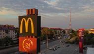 A sign with the logo is on display outside a McDonald's restaurant in Omsk, Russia May 18, 2022. Picture taken with a drone. REUTERS/Alexey Malgavko