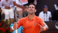 May 15, 2022 Serbia's Novak Djokovic celebrates after winning the final against Greece's Stefanos Tsitsipas REUTERS/Guglielmo Mangiapane/File Photo