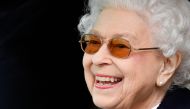 FILE PHOTO: Britain's Queen Elizabeth reacts as she watches horses competing on the second day of the Royal Windsor Horse Show and Platinum Jubilee Celebration in Windsor, Britain, May 13, 2022. REUTERS/Toby Melville/File Photo
