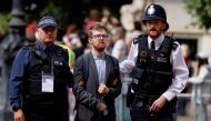 Police officers detain a protester who tried to disrupt the ceremony during the Queen's Platinum Jubilee celebrations on The Mall, in London, Britain June 2, 2022. Reuters/John Sibley