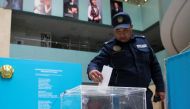 A police officer casts his ballot during a constitutional referendum at a polling station in Nur-Sultan, Kazakhstan, June 5, 2022. Reuters/Pavel Mikheyev