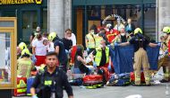 Emergency crews assist the injured at Tauentzien Strasse near Kaiser Wilhelm Gedaedtniskirche church in Berlin, Germany June 8, 2022. Reuters/Fabrizio Bensch