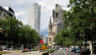 A police officer and police vehicles are seen on Tauentzienstrasse, near the the scene where a car crashed into a group of people, in Berlin, Germany, June 8, 2022. REUTERS/Michele Tantussi