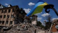 Press officer Olexii Mischenko shows a destroyed city administration building in Bashtanka, Mykolaiv region, as Russia's attack on Ukraine continues, Ukraine June 9, 2022. REUTERS/Edgar Su