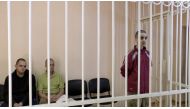 File photo: A still image, taken from footage of the Supreme Court of the self-proclaimed Donetsk People's Republic, shows Britons Aiden Aslin, Shaun Pinner and Moroccan Brahim Saadoun captured by Russian forces during a military conflict in Ukraine, in a courtroom cage at a location given as Donetsk, Ukraine, in a still image from a video released June 8, 2022. Supreme Court of Donetsk People's Republic/Handout via Reuters