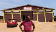 Chef Elijah Amoo Addo, 31, looks on outside the Food For All Africa satellite warehouse in Offinso, Ashanti Region, Ghana June 7, 2022. Reuters/Francis Kokoroko