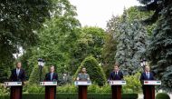 French President Emmanuel Macron, German Chancellor Olaf Scholz, Italian Prime Minister Mario Draghi, Romanian President Klaus Iohannis, and Ukrainian President Volodymyr Zelenskiy attend a joint news conference, as Russia's attack on Ukraine continues, in Kyiv, Ukraine June 16, 2022. REUTERS/Valentyn Ogirenko 