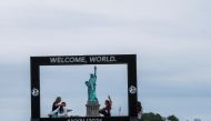 People attend the 2026 FIFA World Cup Host City Selection Watch Party at the Liberty State Park in Jersey City, New Jersey, U.S., June 16, 2022. REUTERS/Eduardo Munoz