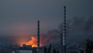 Smoke and flame rise after a military strike on a compound of Sievierodonetsk's Azot Chemical Plant, as Russia's attack on Ukraine continues, in Lysychansk, Luhansk region, Ukraine on June 18, 2022. Reuters
