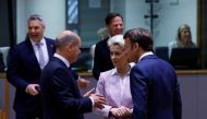 German Chancellor Olaf Scholz, European Commission President Ursula von der Leyen and French President Emmanuel Macron speak after arriving for Western Balkans countries meeting with EU leaders, in Brussels, Belgium June 23, 2022. Reuters/Yves Herman