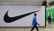 People walk past a closed store of the sporting goods retailer Nike at a shopping mall in Saint Petersburg, Russia, recently. Reuters/Anton Vaganov/File Photo