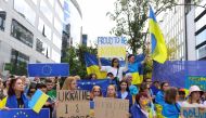 Ukrainians living in Belgium protest outside the European Council building, on the day leaders are set to meet to discuss giving Ukraine candidate status to join the European Union, as Russia's invasion of Ukraine continues, in Brussels, Belgium June 23, 2022. (REUTERS/Johanna Geron)