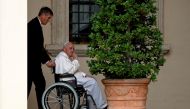 Pope Francis arrives in a wheelchair to meet children with disabilities and Ukrainian children who fled their country, at the Vatican, recently. (Reuters)