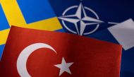  NATO, Turkish, Swedish and Finnish flags are seen in this illustration taken May 18, 2022. Reuters/Dado Ruvic/Illustration/File Photo