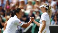 France's Harmony Tan shakes hands with Britain's Katie Boulter after winning their third round match REUTERS/Hannah Mckay