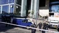 Police officers investigate outside Field's shopping centre, a day after a shooting occurred at the mall, in Copenhagen, Denmark July 4, 2022. Ritzau Scanpix/Mads Claus Rasmussen via REUTERS 
