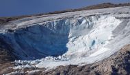 Punta Rocca summit is seen after part of a mountain glacier collapsed in the Italian Alps, at Marmolada ridge, Italy July 5, 2022. REUTERS/Guglielmo Mangiapane