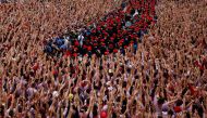 Revellers gather for the opening of the San Fermin festival (Chupinazo) in Pamplona, Spain, July 6, 2022. (Reuters/Vincent West)
