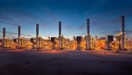 Dolphin Energy's 73 Ras Laffan gas processing and compression plant. right: Receiving facilities at Taweelah, Abu Dhabi.