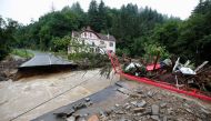 A destroyed road next to the Ahr river is seen on a flood-affected area following heavy rainfalls in Schuld, Germany, on July 15, 2021. REUTERS/Wolfgang Rattay/File Photo


