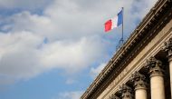 A view shows the French national flag on the top of the Palais Brogniard, former Paris Stock Exchange, located at Place de la Bourse in Paris, France, March 9, 2022. REUTERS/Sarah Meyssonnier

